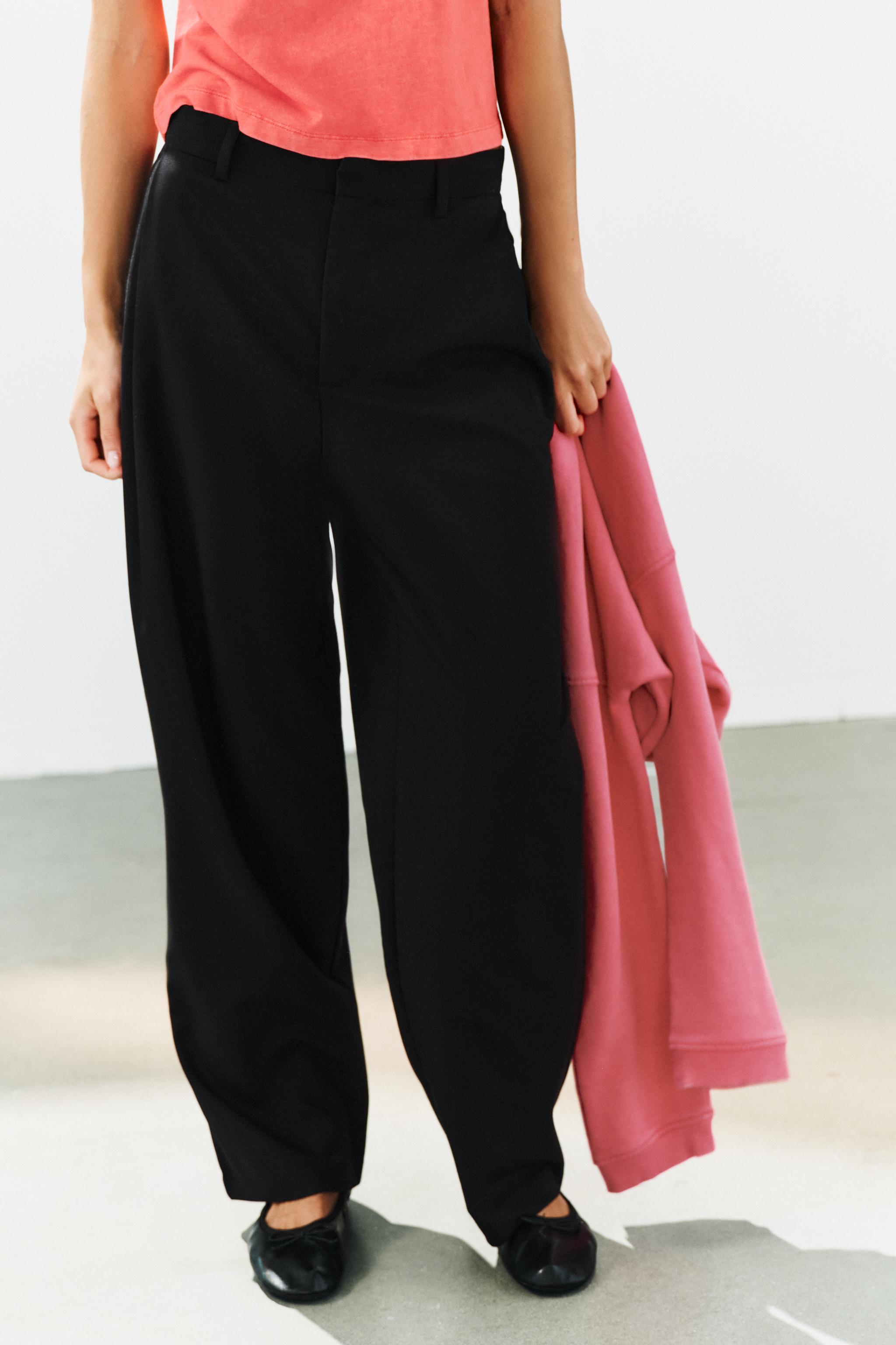 STRIPED PLEATED PANTS